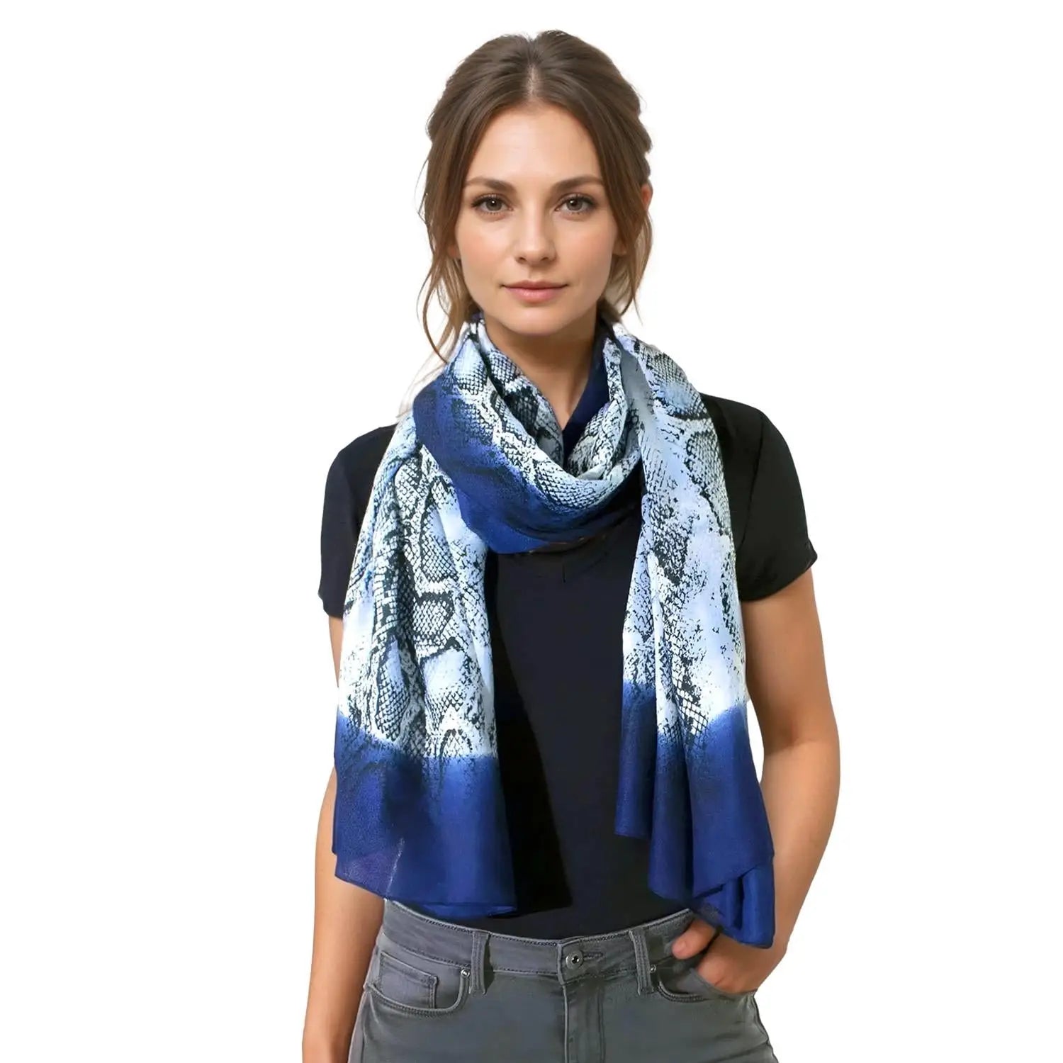 Blue and white patterned oversized scarf styled as a snood for a chic look