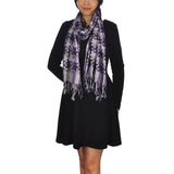 Woman wearing purple and black woven check scarf from Super Soft collection.