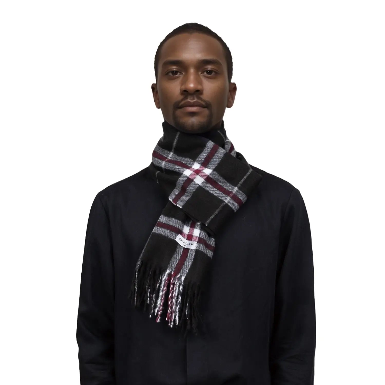 Cozy Tartan Winter Scarf with fringe, worn stylishly around neck for warmth