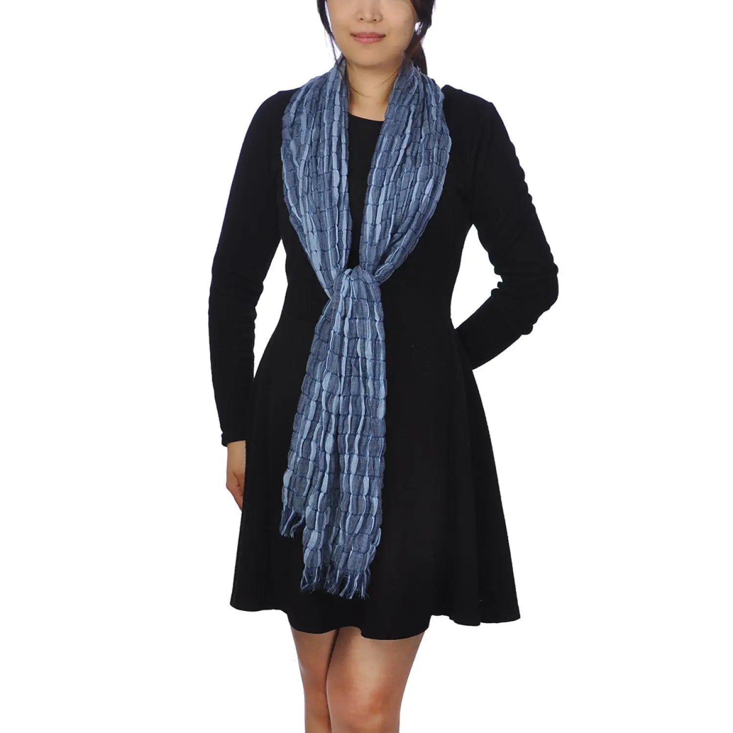 Woman wearing a blue textured check print scarf