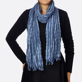 Blue scarf with textured check print on a woman for Textured Check Print Scarf.