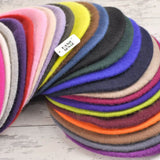 Colorful French wool beret showcasing cozy wool blankets