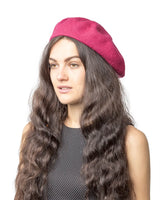 French wool beret in pink worn by woman with long hair