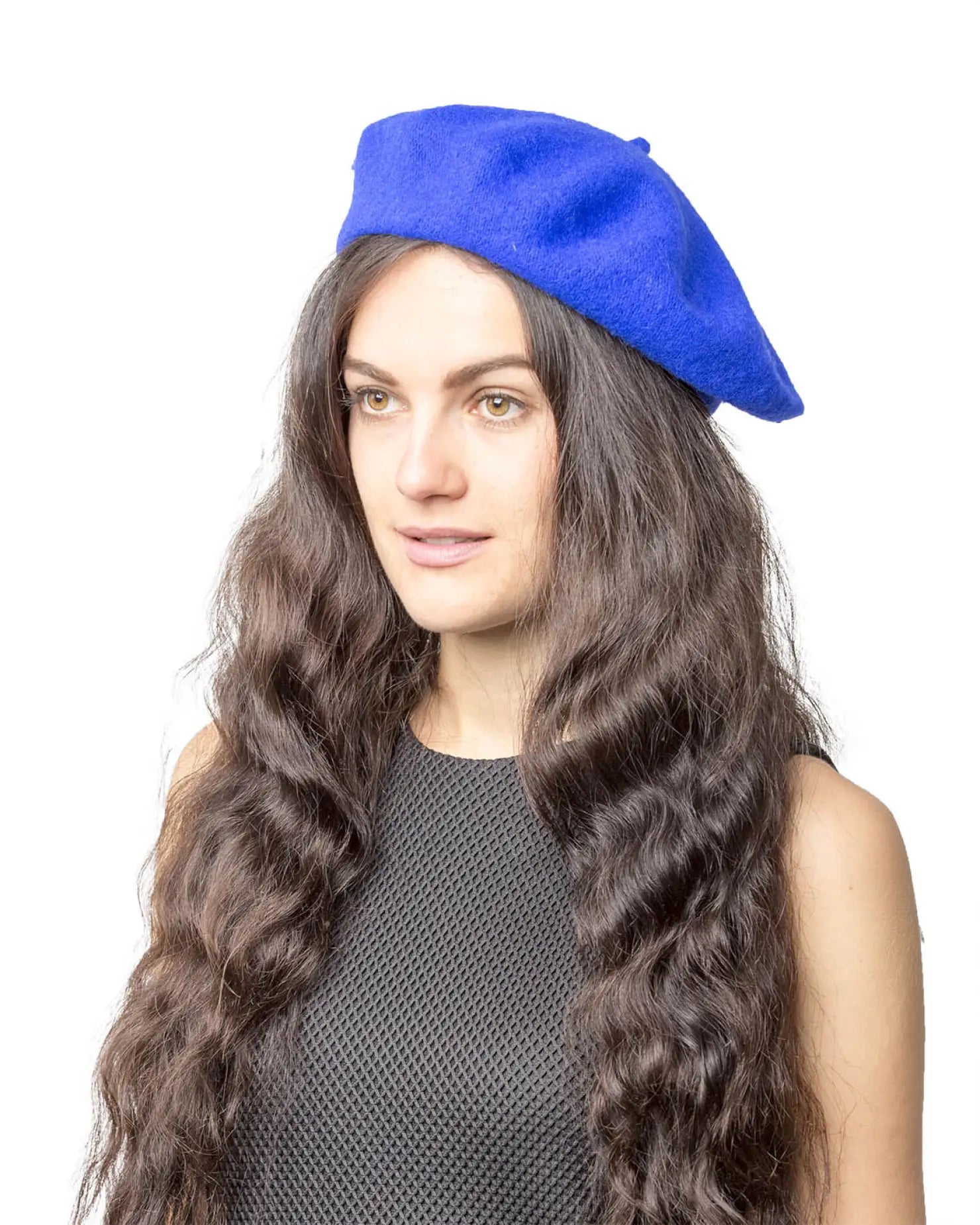 Stylish woman wearing a blue French wool beret