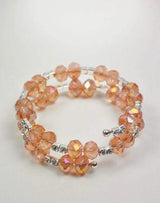 Orange crystal bracelet with diamante rhinestone beads.