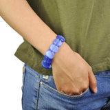 Blue plastic bead bracelet from Tri-set Pastel Elastic Bracelets.