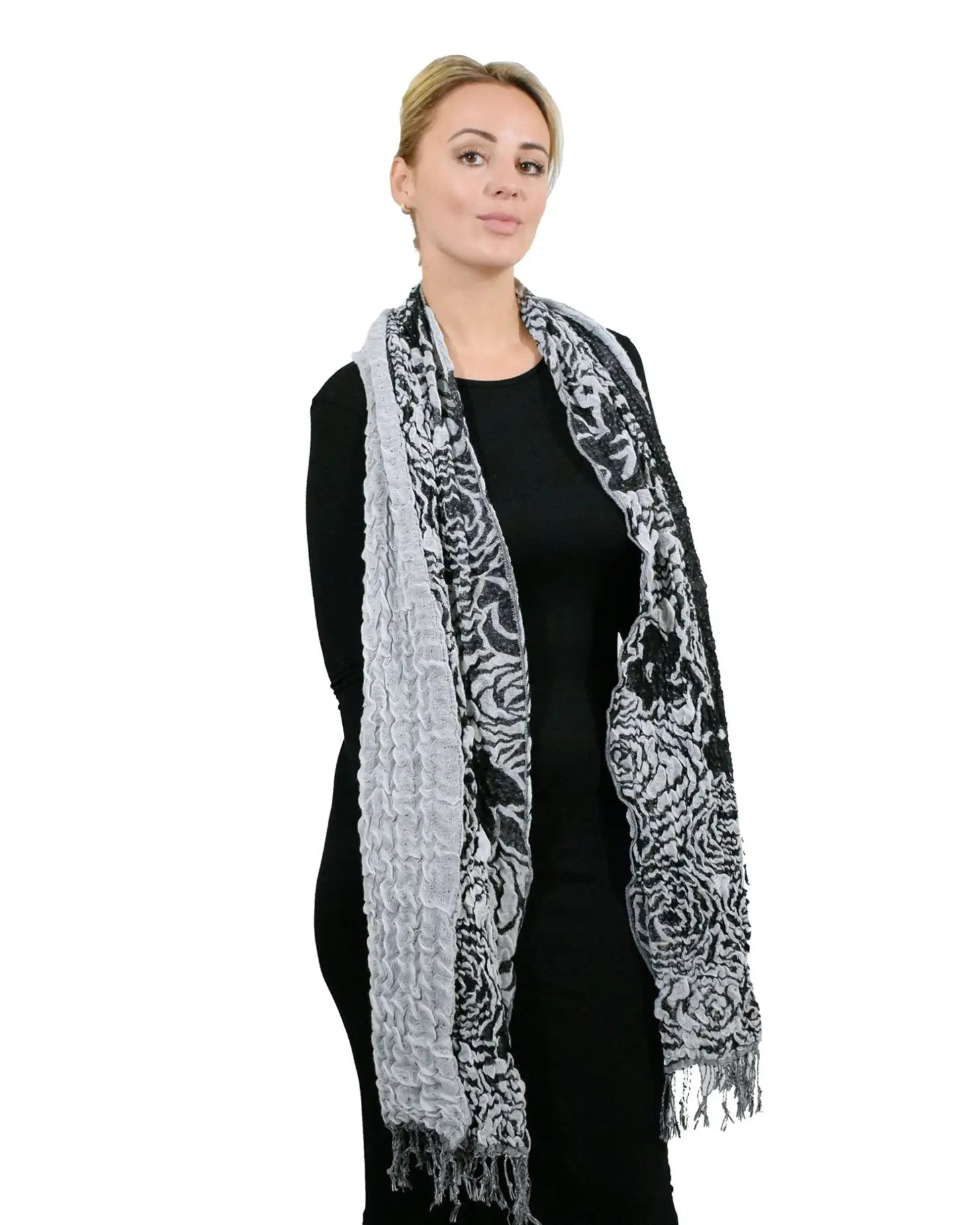 Woman wearing black and white scarf from Two Tone Textured Bubble Look Scarf.