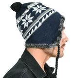 Peruvian winter hat with snowflake pattern in unisex style