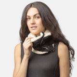 Woman in black dress holding white and black cat, featured with Unisex Sherpa-Lined Chunky Buttoned Snood Scarf.