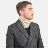 Black and white tweed jacket displayed in Unisex Sherpa-Lined Knitted Snood.
