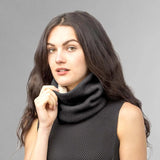 Unisex Sherpa-Lined Knitted Snood: woman in black sweater holding bread
