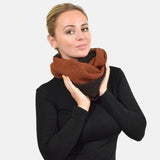 Stylish arafed woman in two tone winter snood scarf.