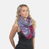 Vibrant boho aztec snood: woman in purple and blue scarf