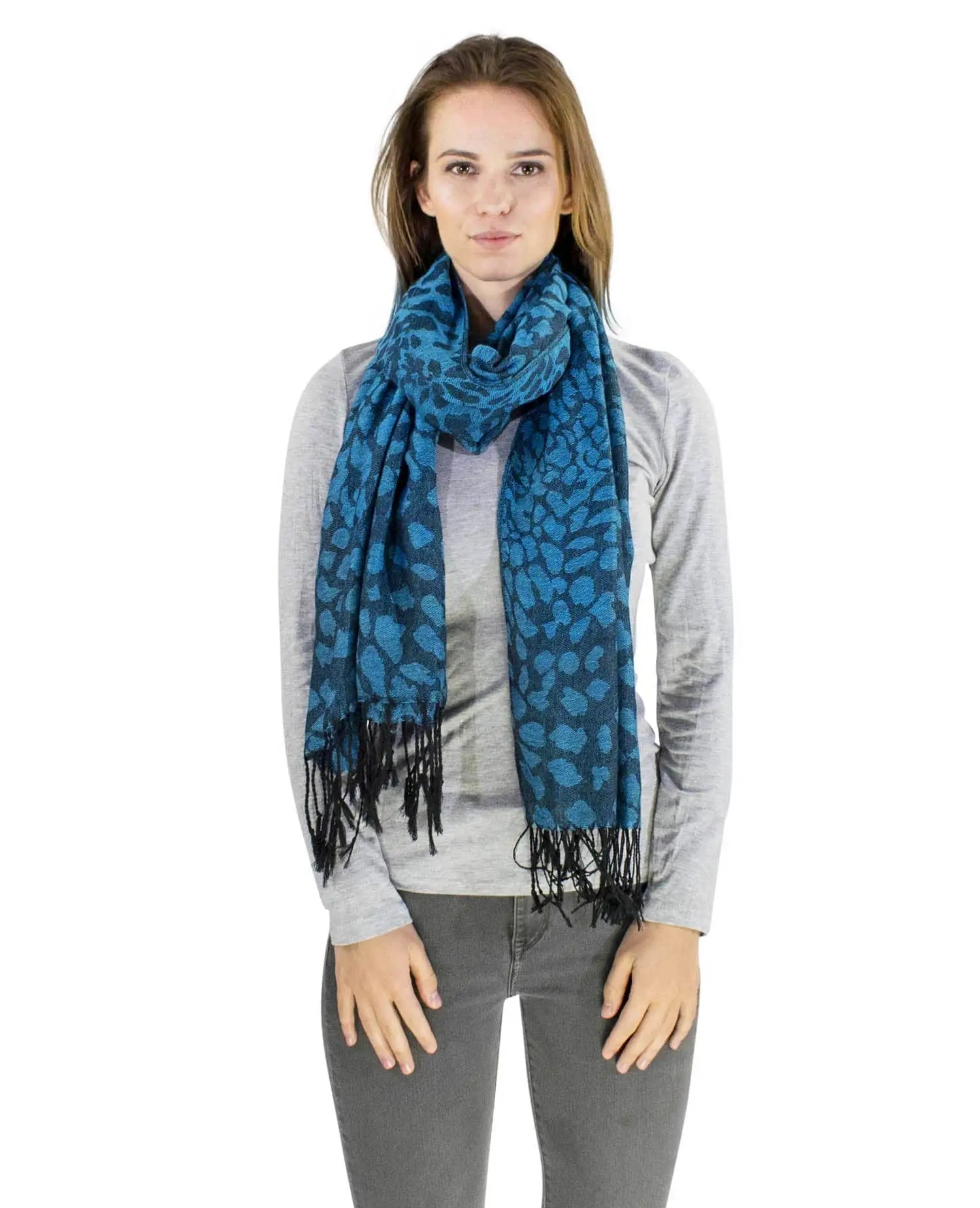 Woman wearing blue leopard print pashmina scarf