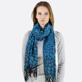 Leopard print pashmina scarf on woman with blue scarf