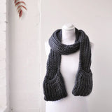 Winter Chunky Knitted Scarf with Pockets displayed on mannequin wearing scarf and gloves