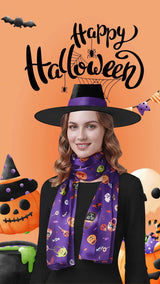 Woman wearing a black witch hat and a purple Halloween-themed scarf.