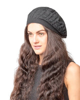 Woman with long brown hair wearing black hat - Women’s Cable Design Knitted Crochet Beanie Hat