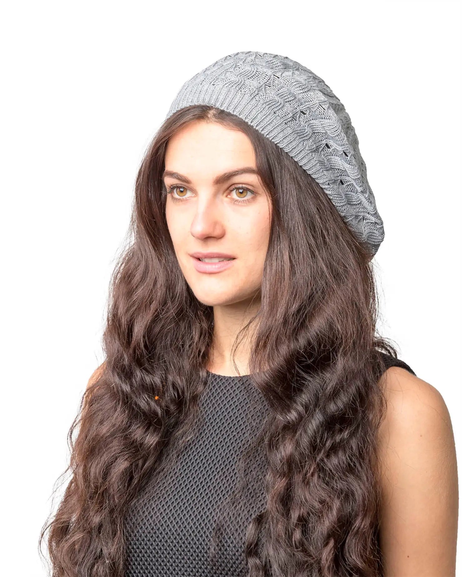 Woman with long brown hair wearing gray hat - Women’s Cable Design Knitted Crochet Beanie Hat