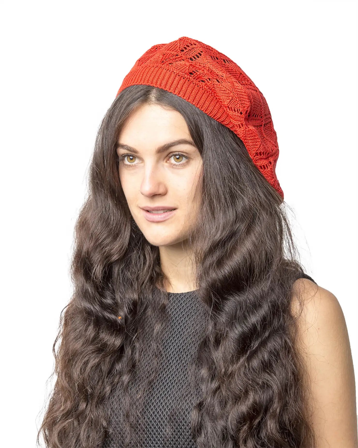 Woman wearing red knit hat from Women’s Leaf Design Knitted Crochet Beanie Hat