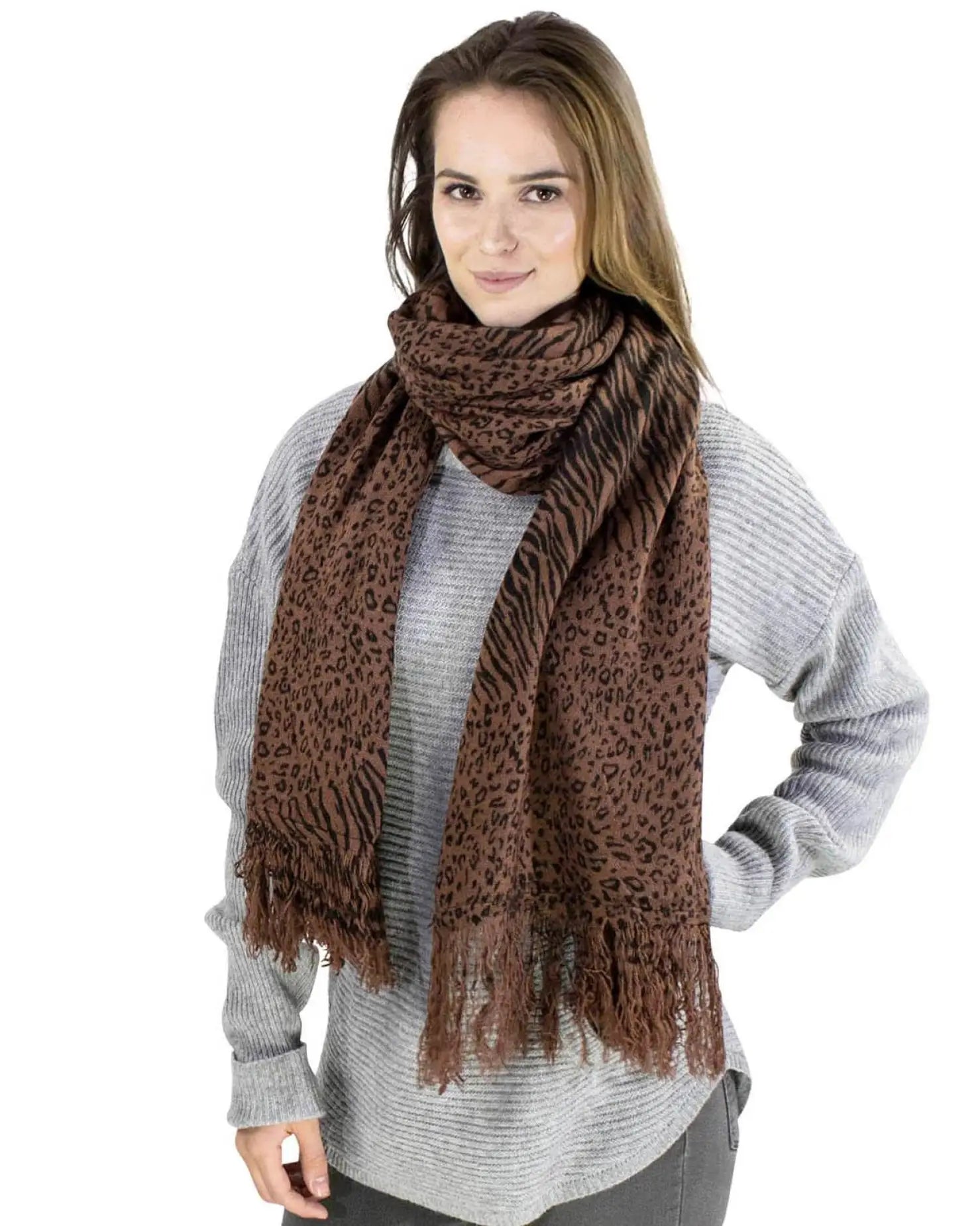 Woman wearing brown leopard & zebra print winter scarf