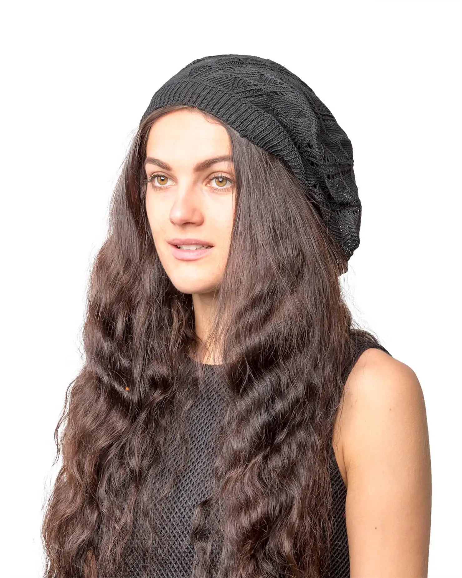 Woman in black hat with long brown hair modeling Women’s Triangle Design Knitted Crochet Beanie Hat
