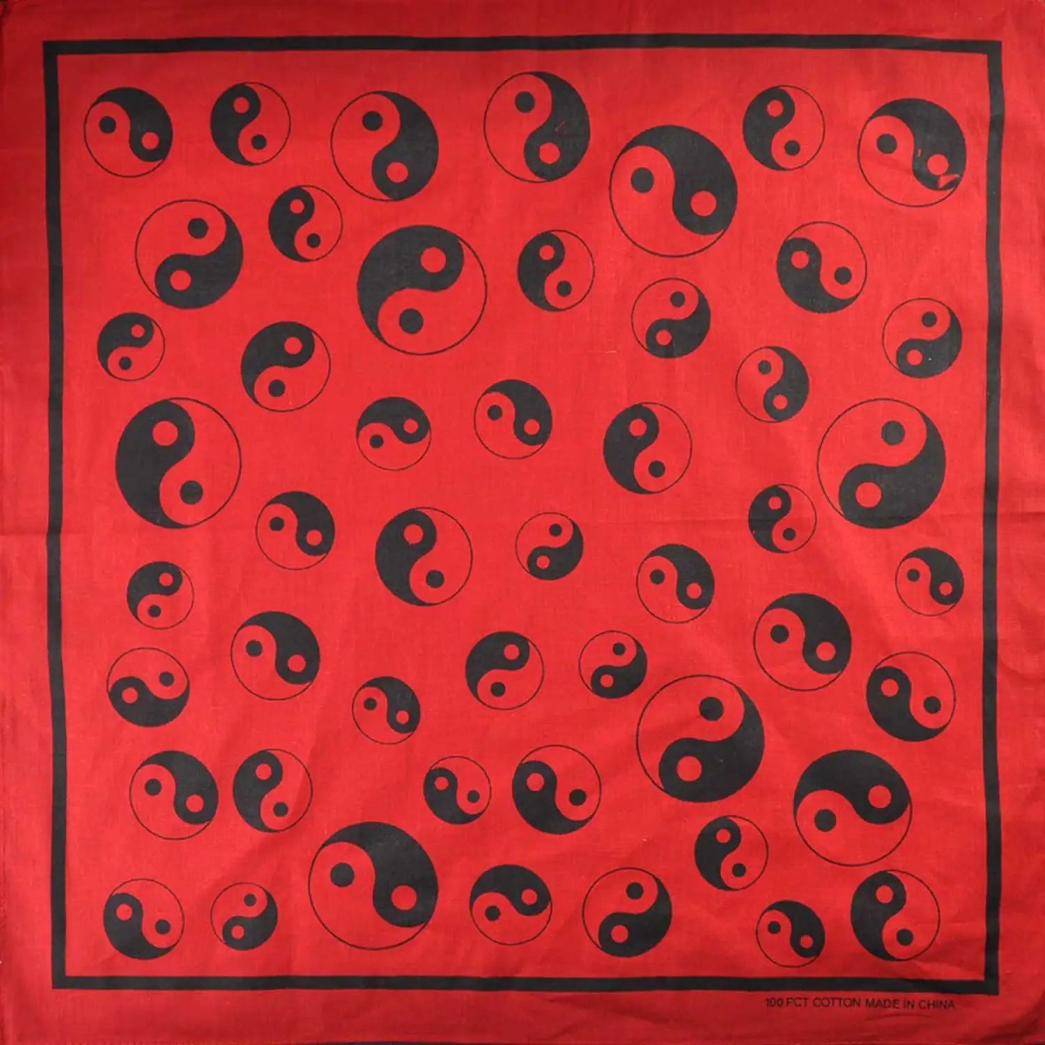 Red scarf with black and white circles on Ying Yang Print Square bandana
