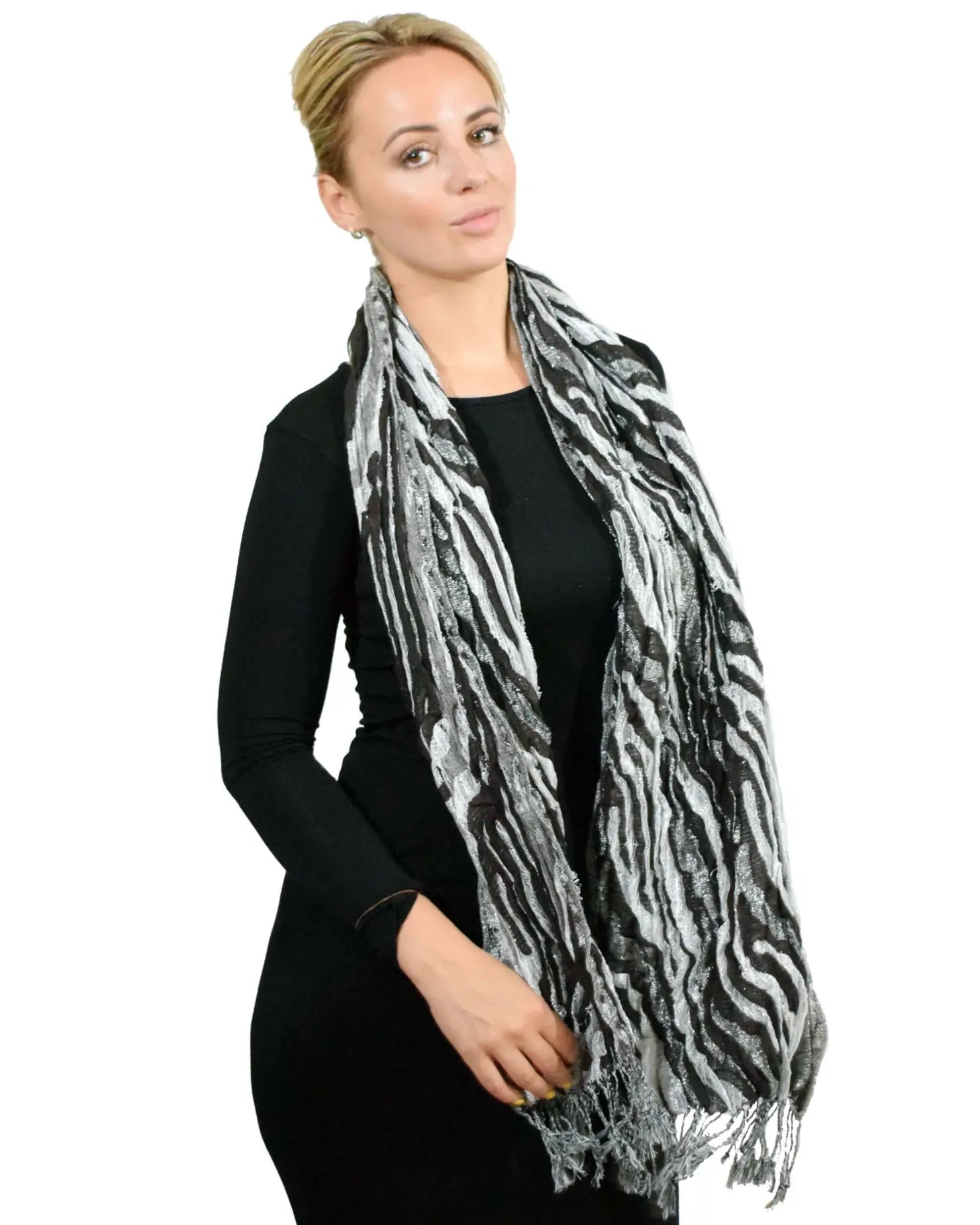 Zebra Print Metallic Tasselled Scarf worn by a woman