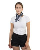 Zebra print square bandana on woman in white shirt and black shorts